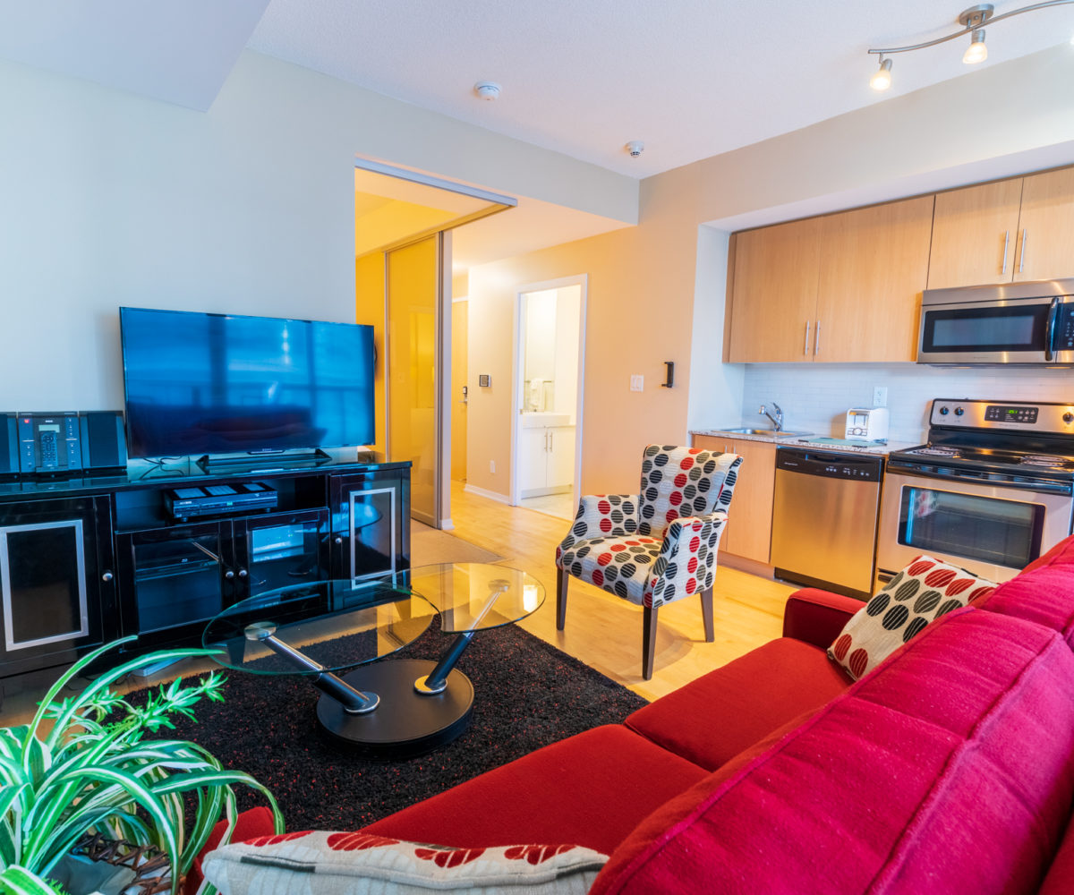 Suite for Rent at Maple Leaf Square Downtown Toronto. Living Room Kitchen TV