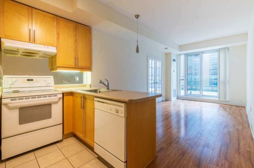 Suite for Rent at Elev’n Residences. Toronto, Ontario. Kitchen Living Room Terrace